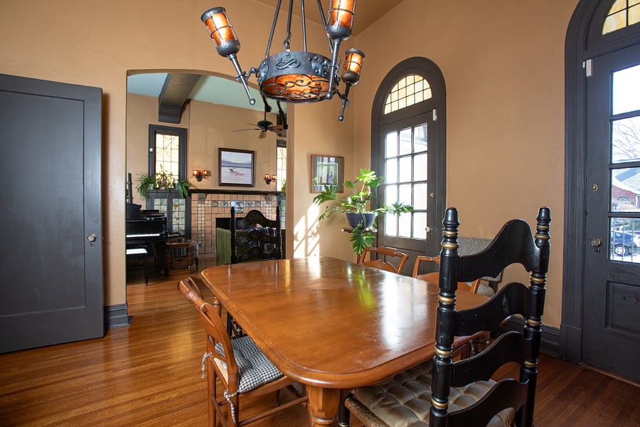 Dining room with doors leading to patio.