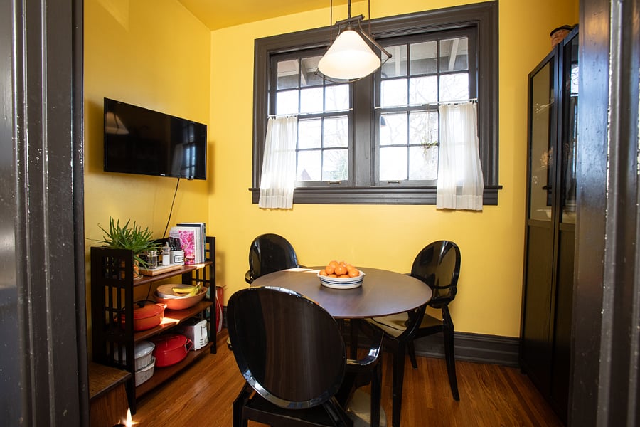 Kitchen dining nook with TV.