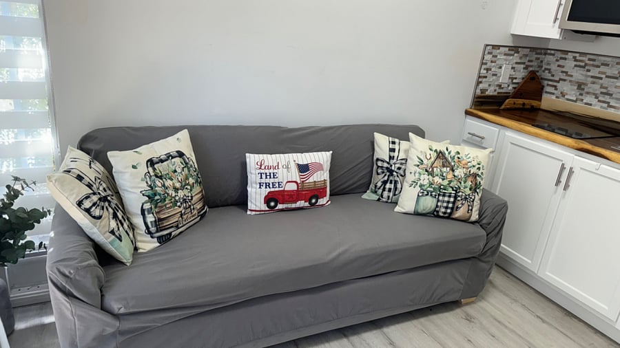 Sofa bed open to a Queen size bed for guests