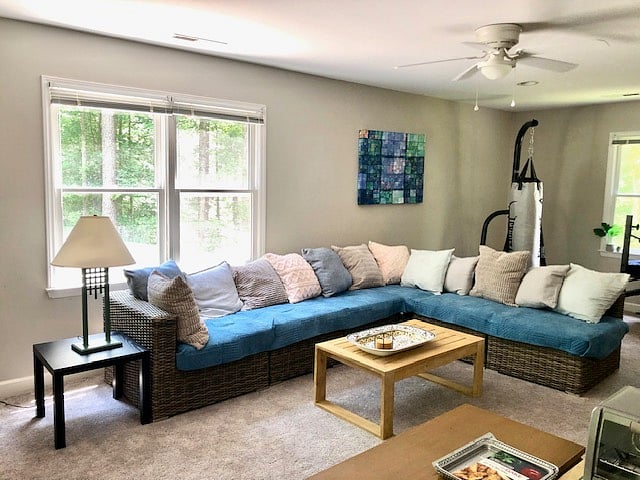 Living room with kitchenette, dining table and lots of seating.
Fire TV.