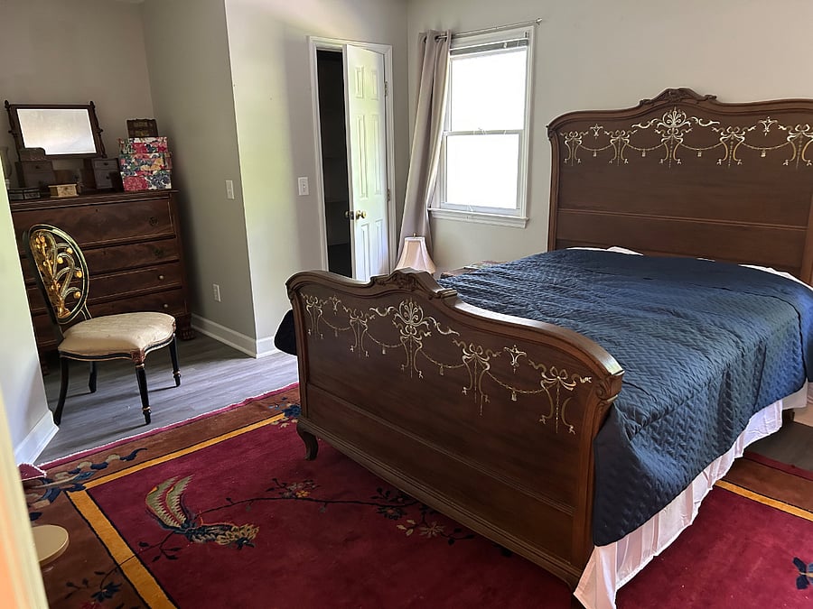Bedroom #2 with double bed, ensuite full bath, and 2 large closets.