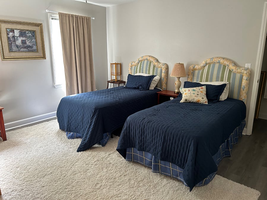 Bedroom #3 with 2 twin beds, also has ensuite full bath and large closet.