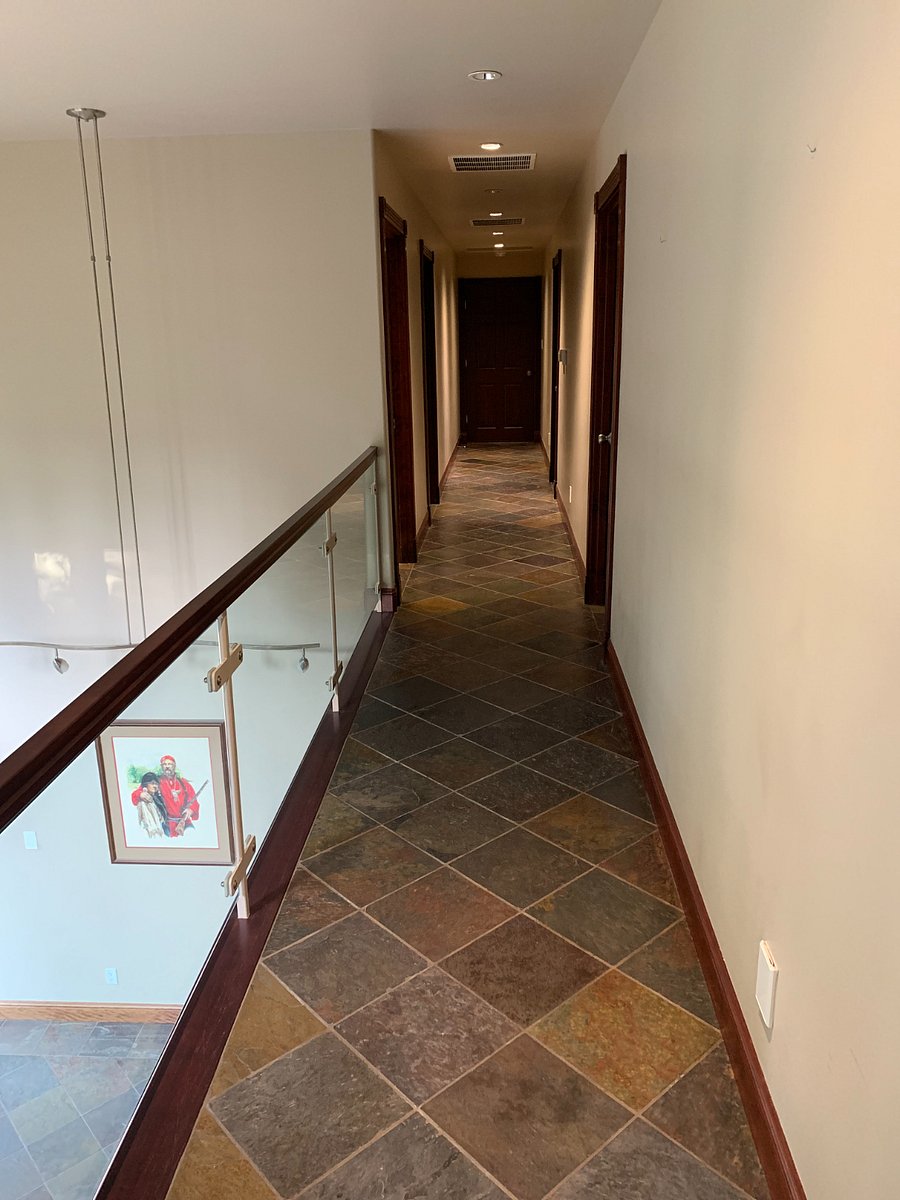 Second floor with three bedrooms, full bath and theater