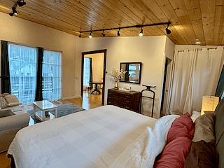 Bedroom showing entry to dining area.