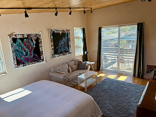 Bedroom showing sliding door to balcony.