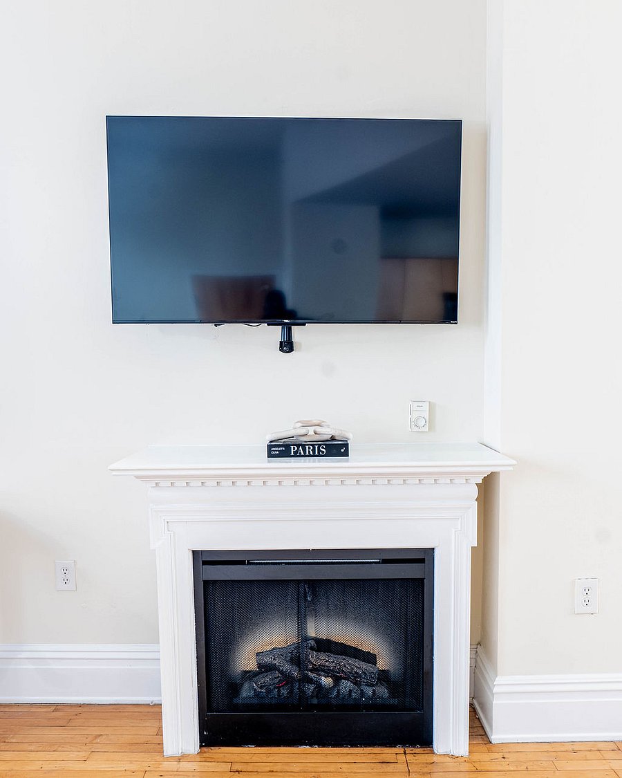 Electric Fire place and 55" rotating TV