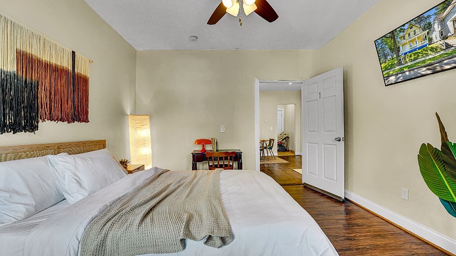 **Bedroom 1**:  Features Working Desk, And Smart TV.