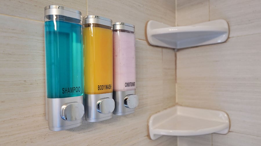 Shampoo Dispenser With Convenient Refills Included.