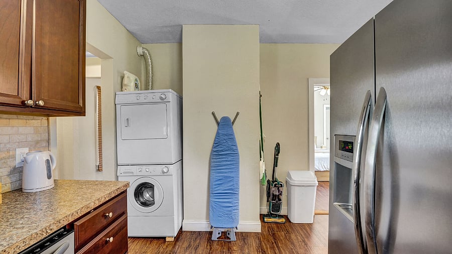 **Kitchen**: In-unit Washer/Dryer, Full Iron Board, Cleaning supplies.