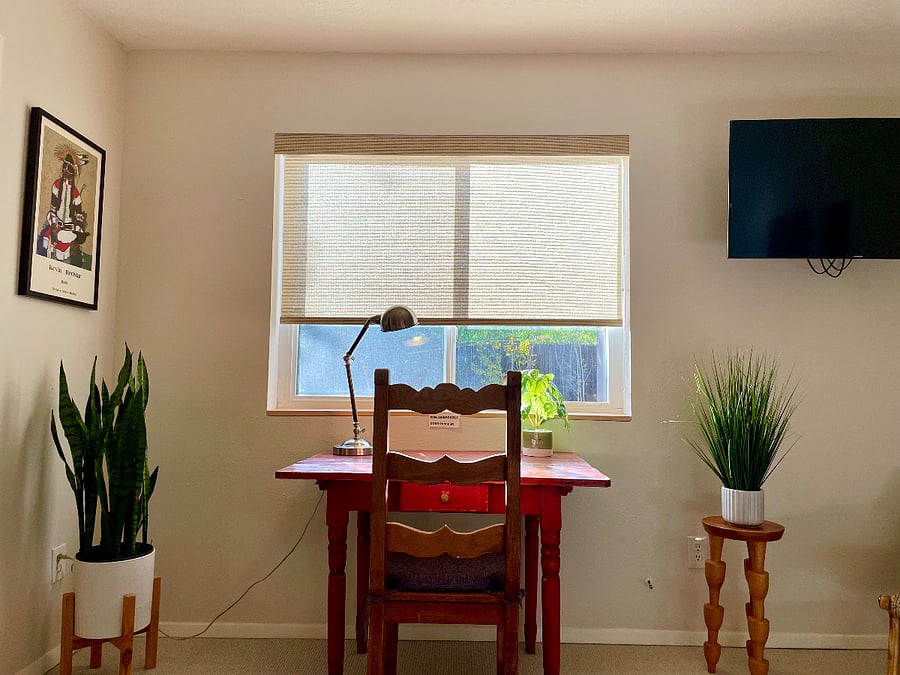 Desk in main bedroom looks out on to backyard