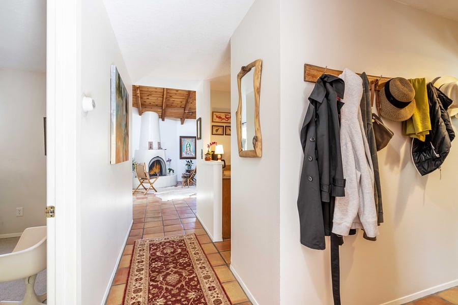 view from front door, main bedroom on left and guest bedroom on right down hallway