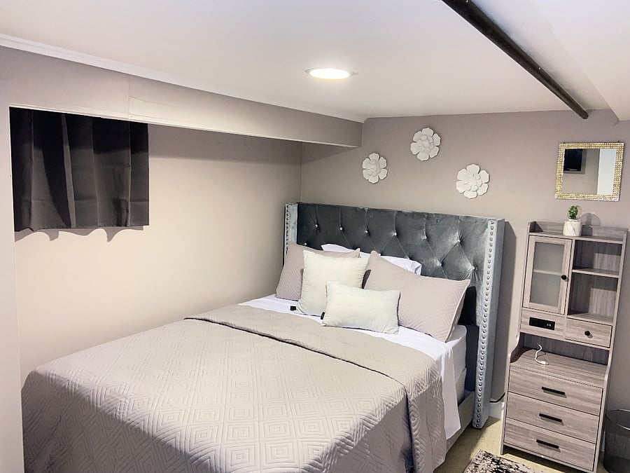 Bedroom Number 2 - Fullsize bed, Bedside table /charging station, mounted TV, Closet.