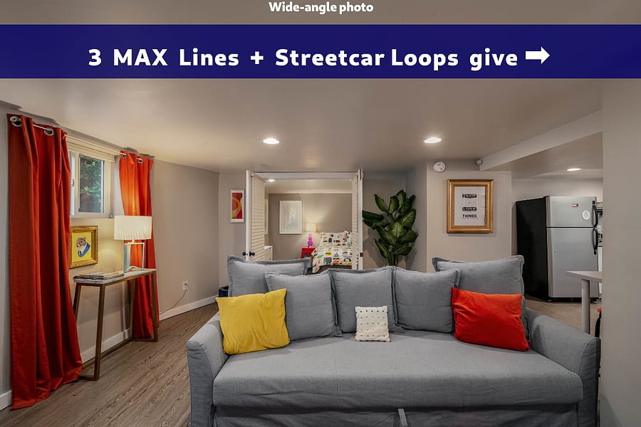 With amenities for 4 adults 3 light rail MAX lines are a flat 10 minute walk and city circling Streetcars are only a 7 minute walk. Our transit Score is 83. Close enough to be very convenient while far enough away that you will not hear it.