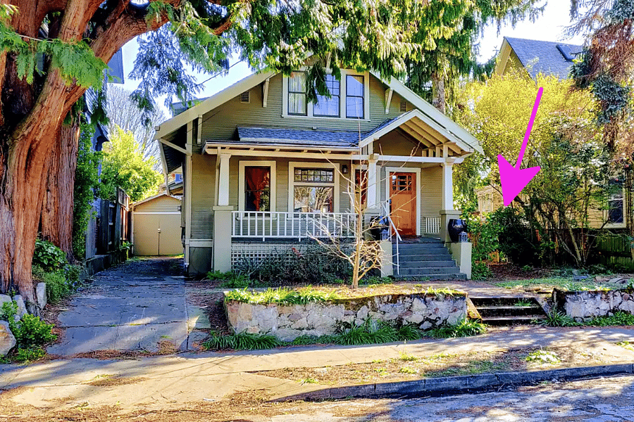 The private entrance to your apartment is via a path on the right side of this historic 1908 Craftsman designed by noted Portland architect Emil Schacht. (See Wikipedia for his other work.)