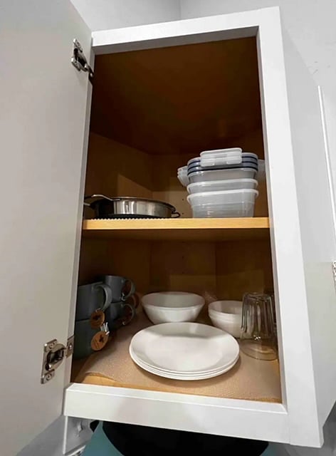 Plenty of plates, bowls, food storage. 