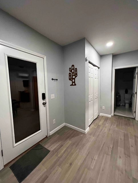 Private entrance through the driveway. Parking is right outside the door. 