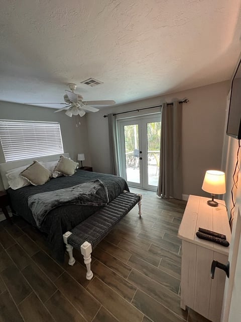 Master Bedroom with TV and King Bed