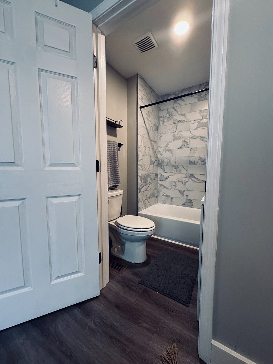 Bathroom 1 with shower/tub combo.
