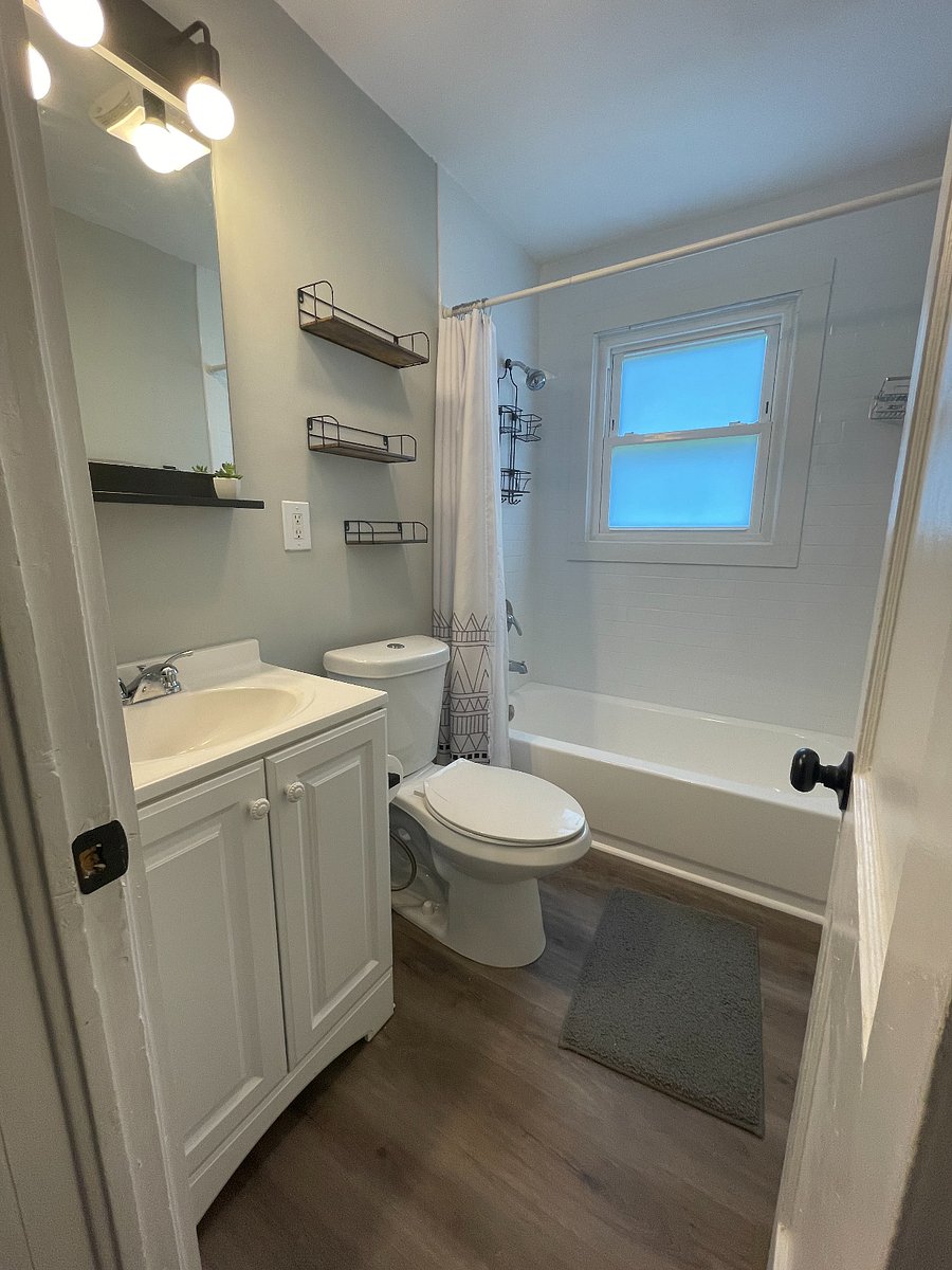 Bathroom 2 beside bedroom 2 with a tub shower combo.