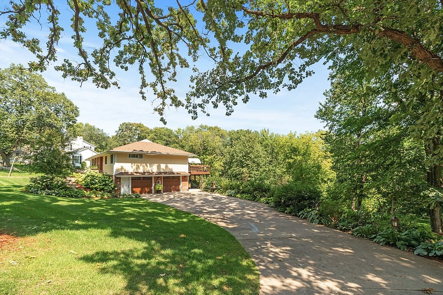 2 car garage + huge driveway for extra parking. Tesla charger in the garage.