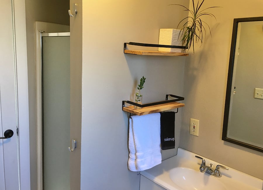 Bathroom has a small shower (no tub)