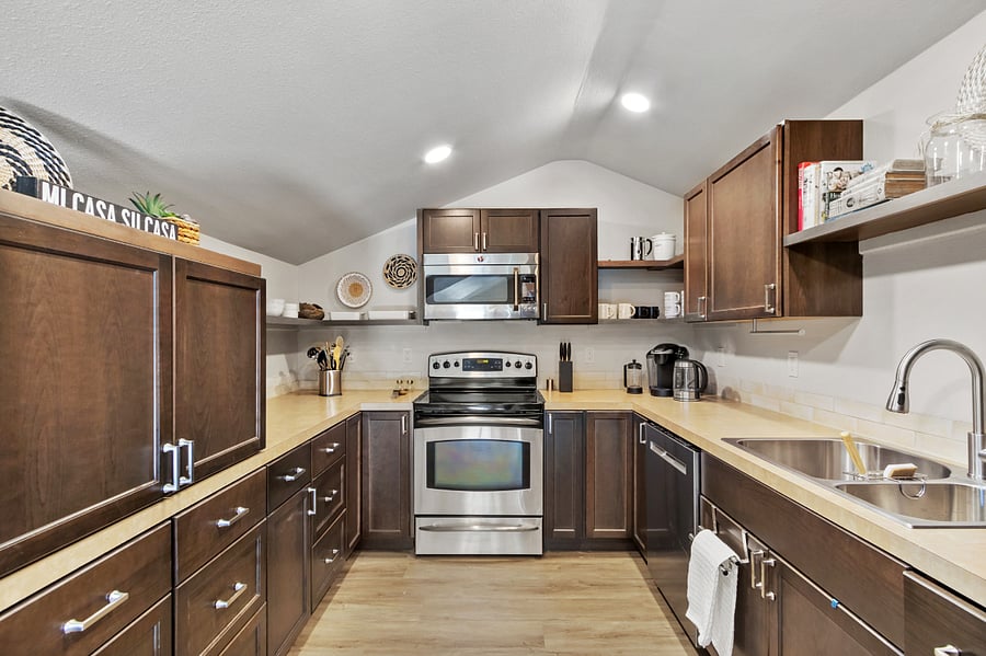 Full size kitchen with all the necessary amenities and lots of cabinets to store your food 