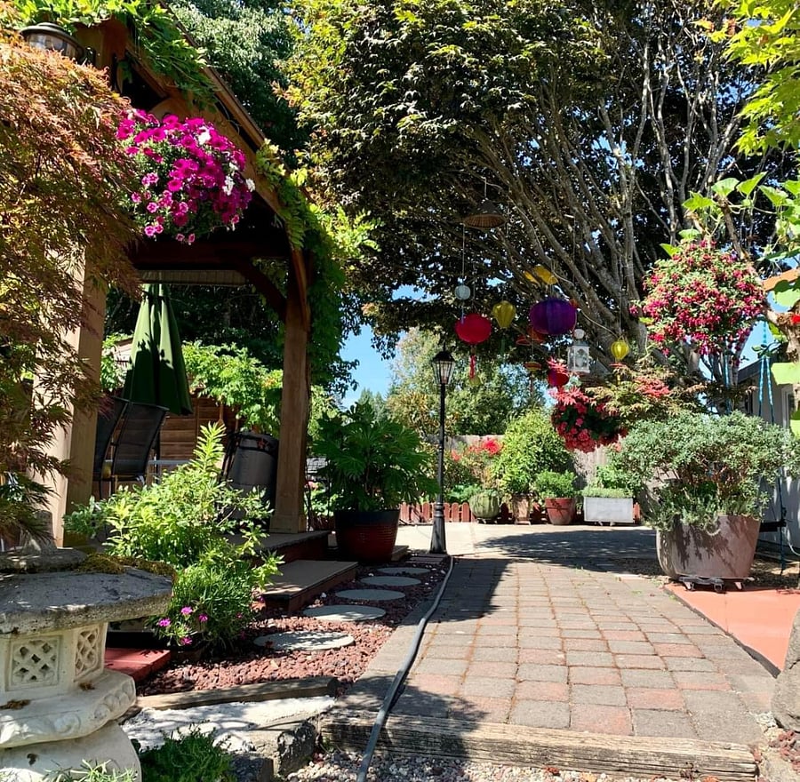 Outdoor shared garden space with outdoor seating. 