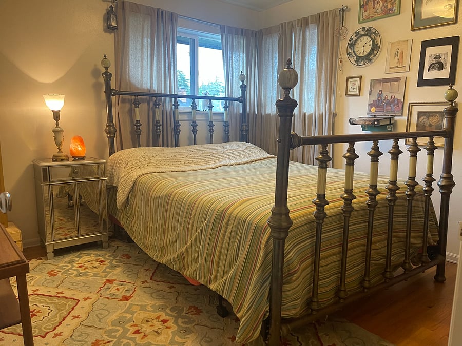 2nd bedroom with Queen Bed, old fashion feeling, big closet with a dresser inside.