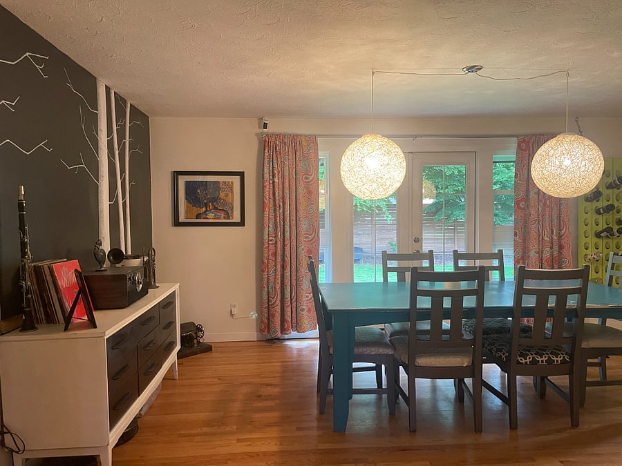 Dining Room, patio doors to backyard, photo taken from entry hallway area of home.