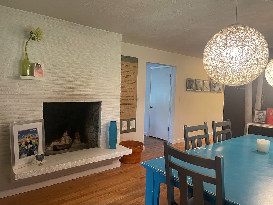 Dining room with fireplace.