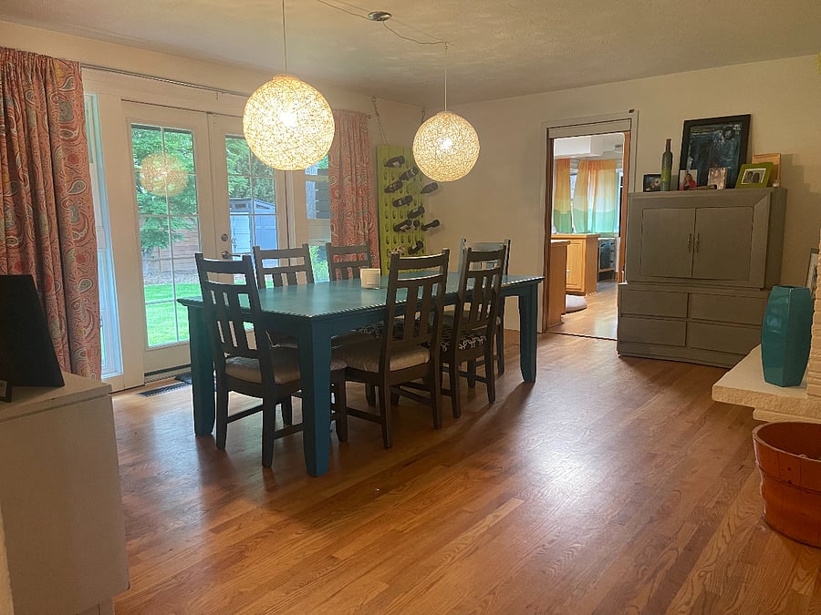 Dinning room, view from the hallway to the bedrooms. Kitchen is in the distance.