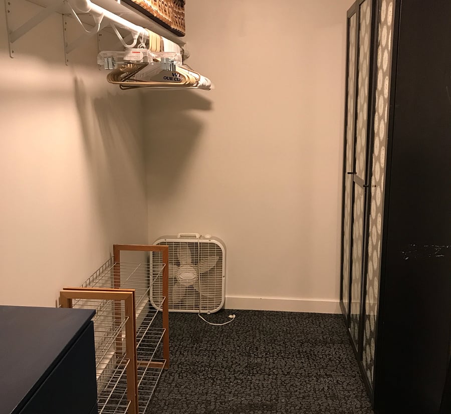 Walk In Closet with storage cabinets