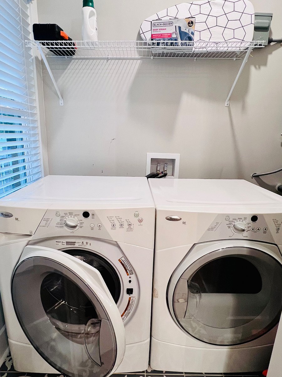 Laundry with Large washer and dryer on main level.