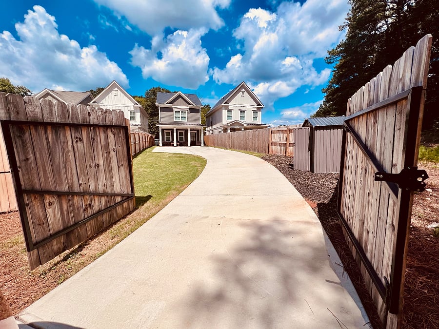 Fenced Back Yard with space for 2 cars