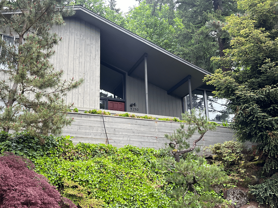 Street view of property surrounded by nature on a very quiet dead end street.
