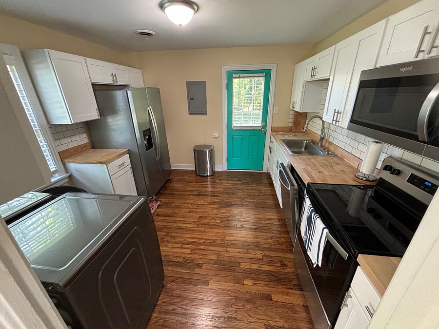 Kitchen and door leading to the back porch