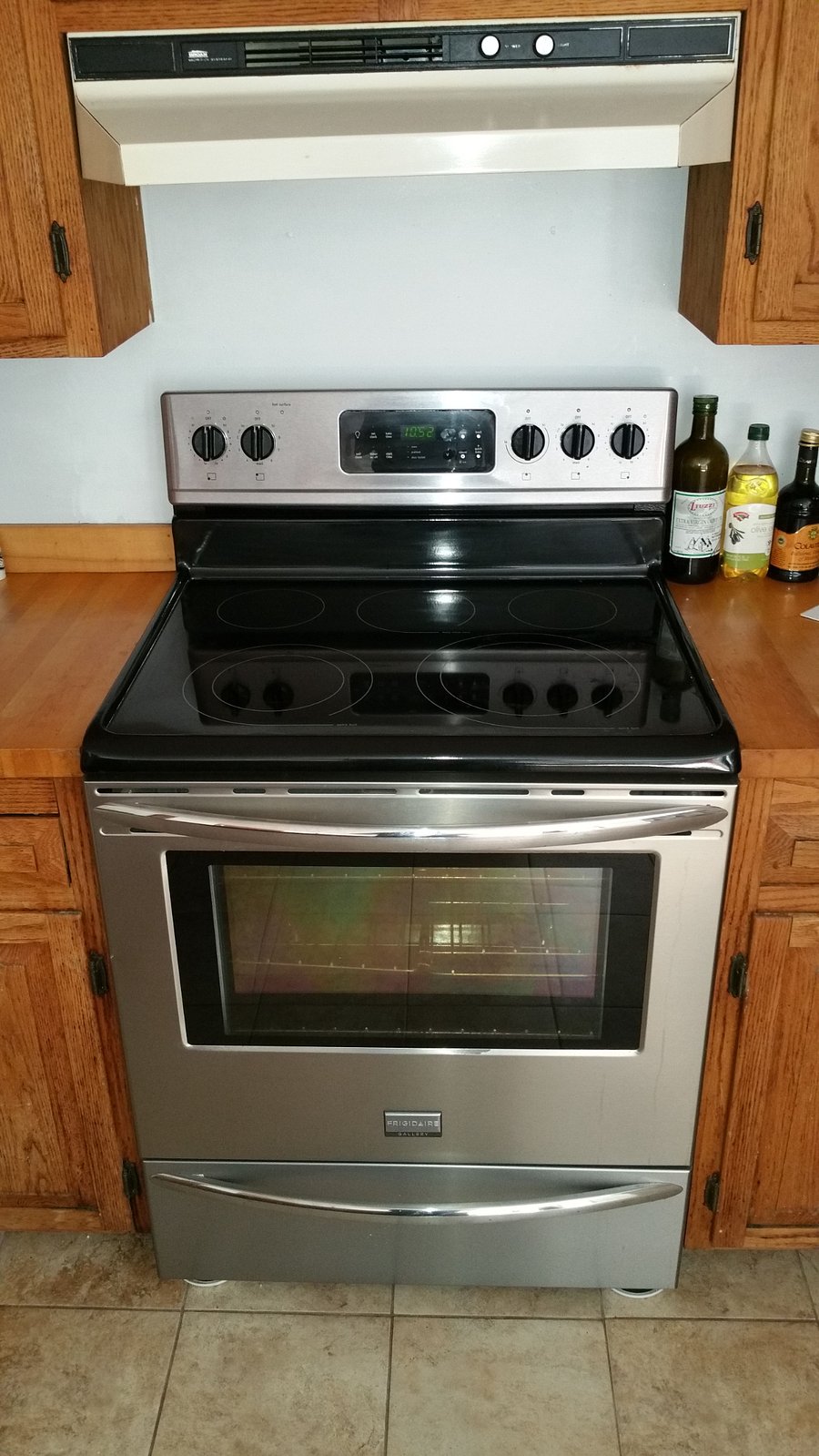 Glass-top range and convection oven.