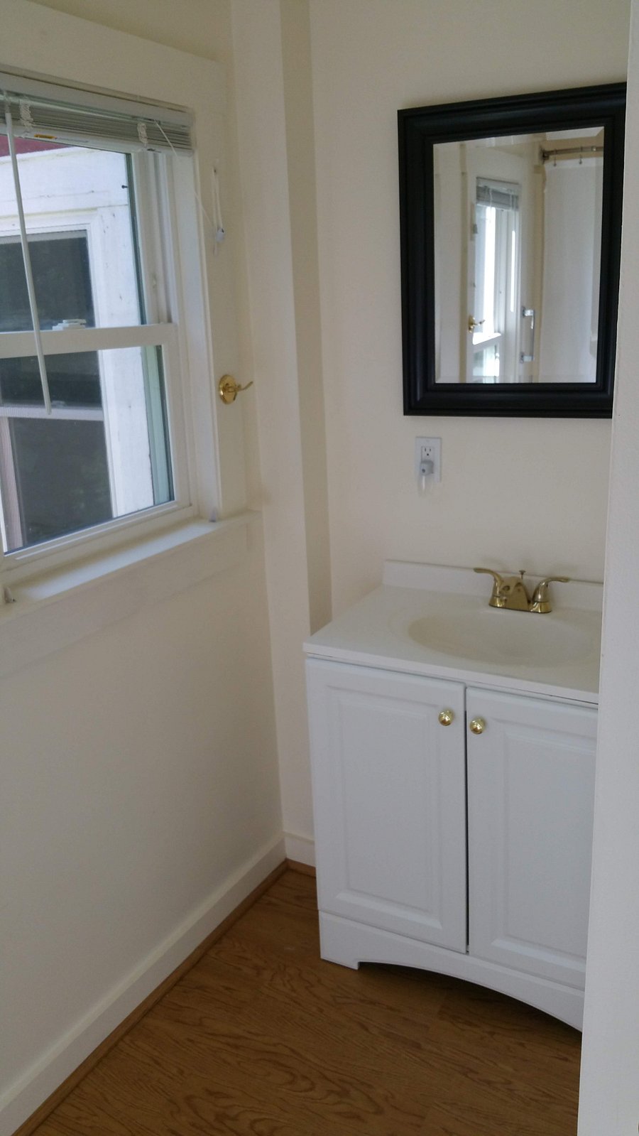 Bathroom is roomy and has a closet for linens and personal supplies.