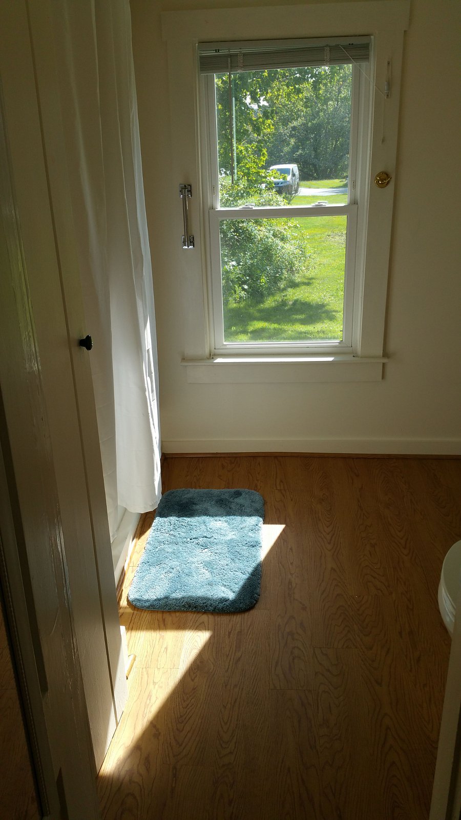 Bathroom has large tub/shower.