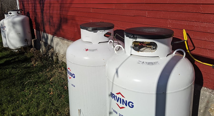 Unit has its own, separate propane tanks and propane service from Irving.