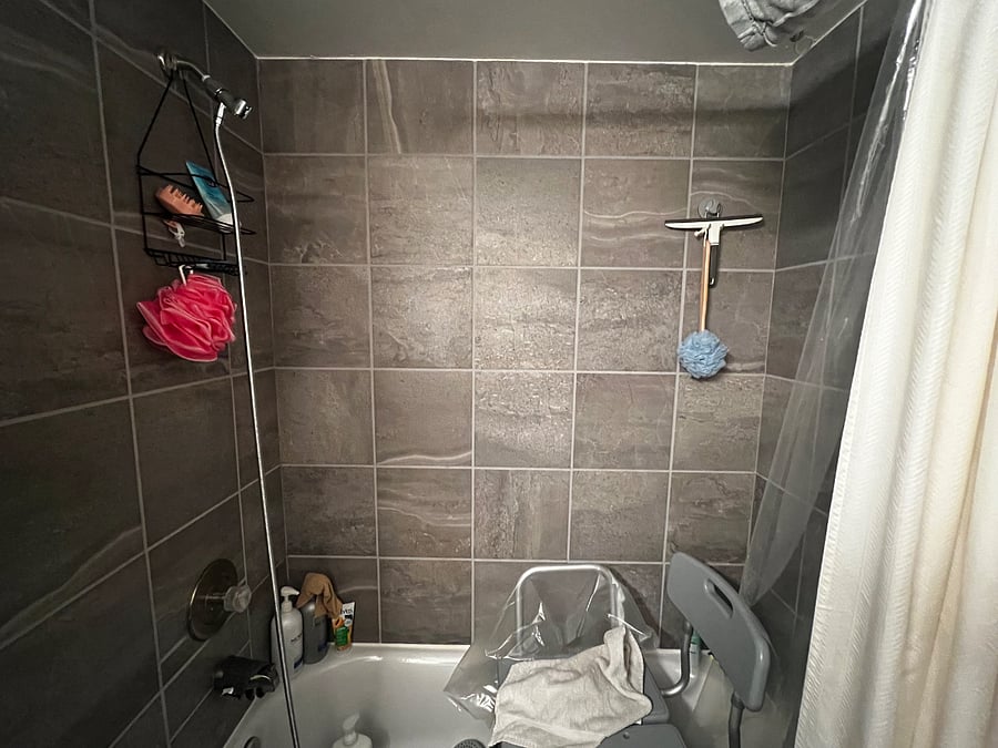 Smaller bedroom tiled shower bathtub combo