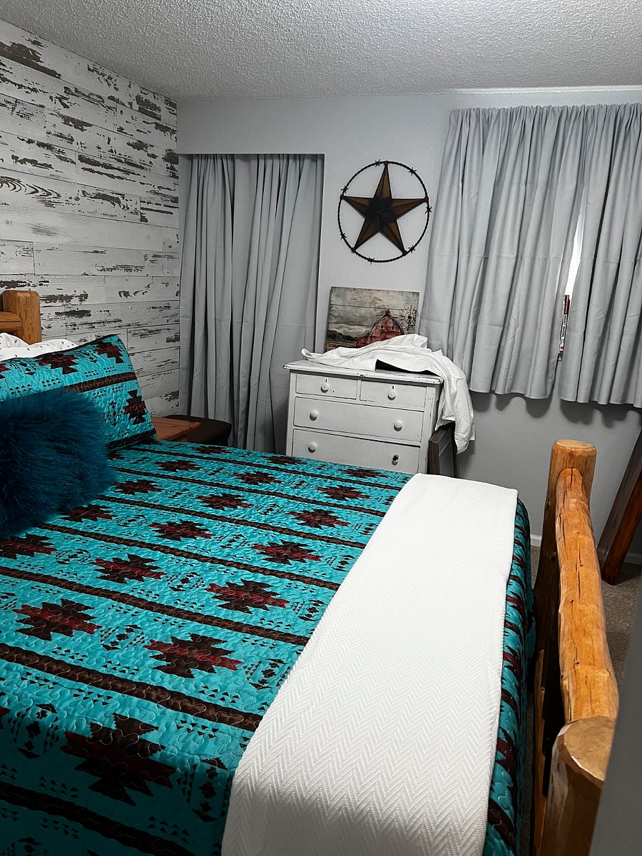 2nd small guest room with Queen bed and antique dresser