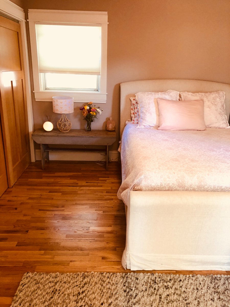 master bedroom with French doors to separate sitting room and master bath