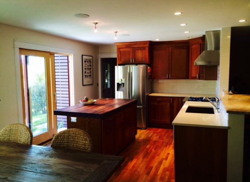 modern chefs kitchen, with gorgeous dining table with views, opens up to lovely patio and backyard bliss