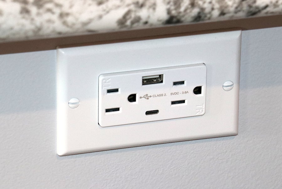 Built in USB charging ports on entry knee wall and on kitchen island