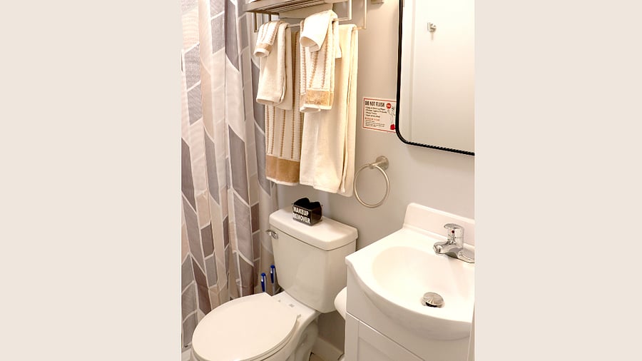 Second bathroom is full bath with shower, toilet and sink