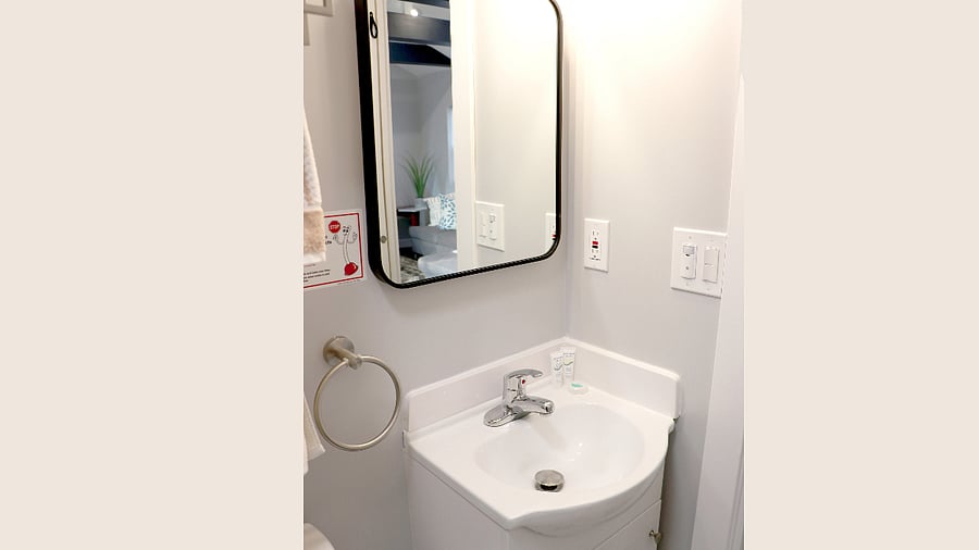 secondary bathroom sink and mirror