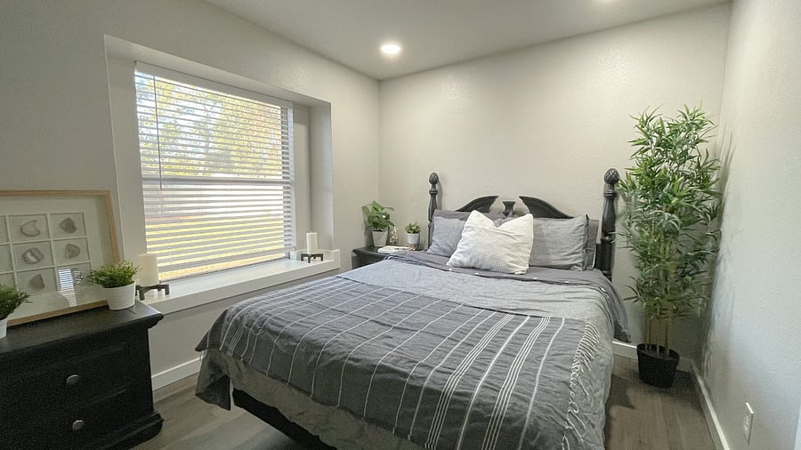 Guest Bedroom with 42" TV and concealed closet.  Fully furnished queen bed-set and bedroom. 