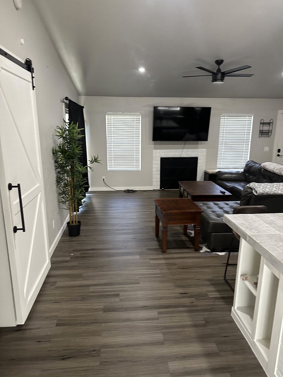70" Smart TV in Living room.  Brand new couches and accessories.