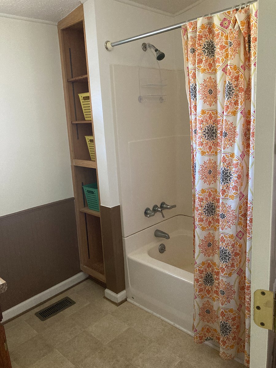 real tub for option to soak or shower